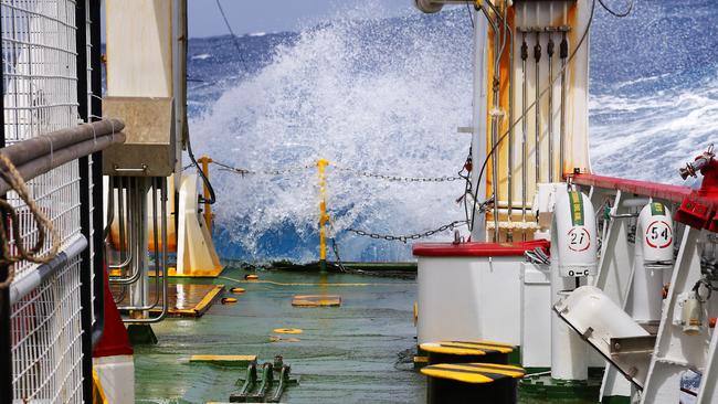 Waves crash over the back deck of Fugro discover as she continues in the search for the missing Malaysia Airlines flight MH370. *** Local Caption *** Fugro Discover continues the seabed search for the missing Malaysia Airlines flight MH370 in the Southern Indian Ocean.