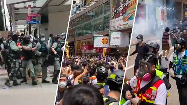 Thousands defy social distancing to protest proposed security bill in Hong Kong