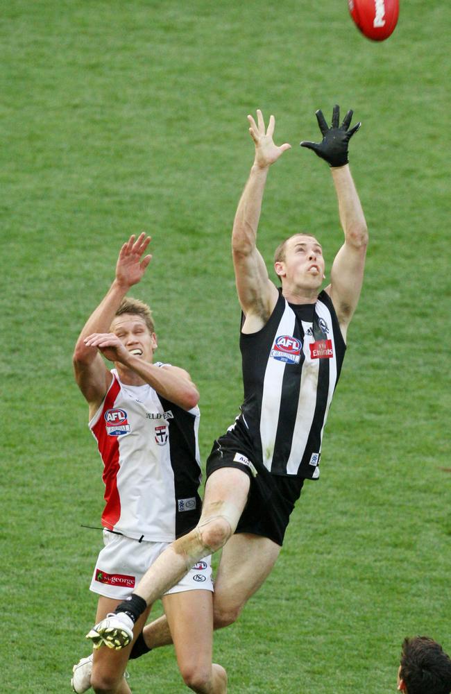 Nick Maxwell takes a match-saving mark over Saint Sam Gilbert in the 2010 Grand Final. Picture: Andrew Tauber