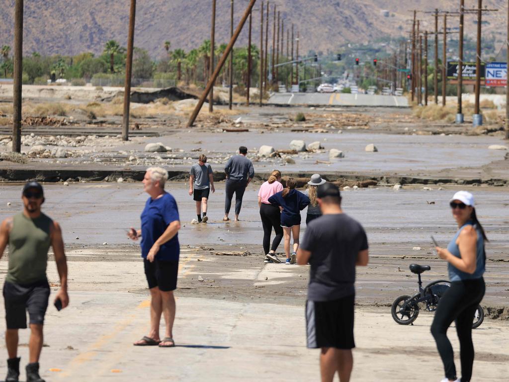 Rocks and mud cover a damaged street following heavy rains from Tropical Storm Hilary in Cathedral City, California. Picture: AFP