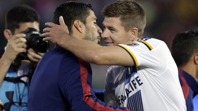 LA Galaxy's Steven Gerrard hugs former teammate Luis Suarez.