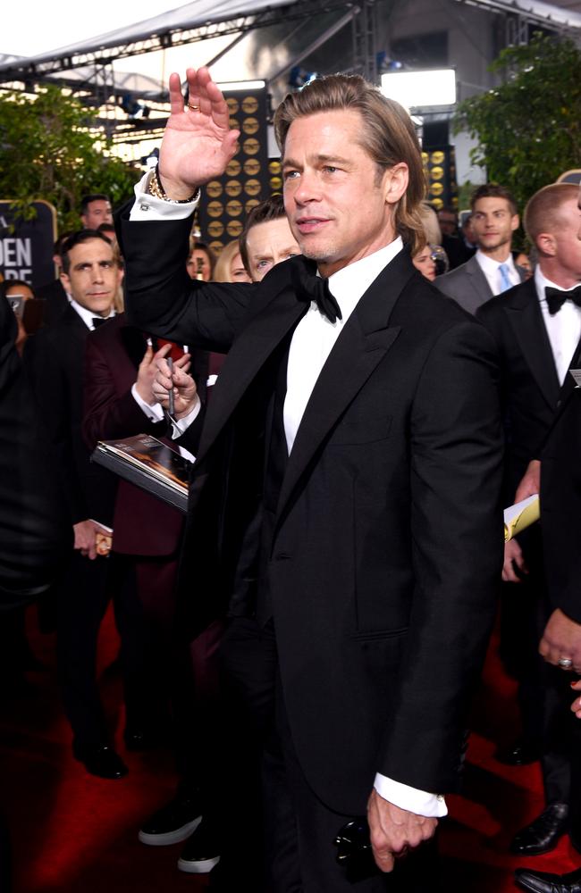 A candid moment as Brad Pitt arrived at The Beverly Hilton Hotel. Picture: Getty Images for Icelandic Glacial