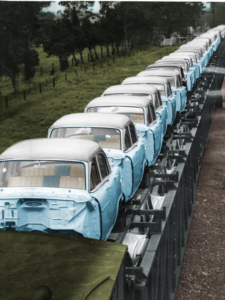 Seventy new FE Holden motor car bodies leave the General Motors-Holden factory at Woodville on a special train bound for the eastern states on July 21, 1956.