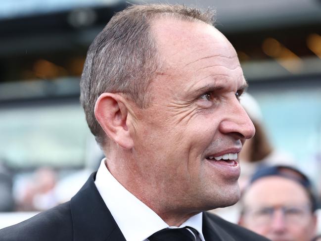 SYDNEY, AUSTRALIA - APRIL 05: Trainer Chris Waller celebrates after Damian Lane riding Aeliana win Race 9 ATC Australian Derby during 