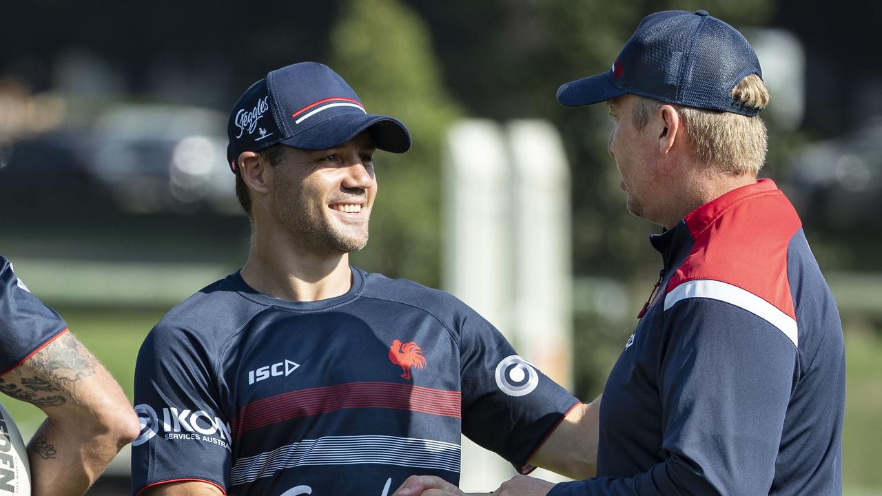 Roosters coach Trent Robinson and Cooper Cronk at training.
