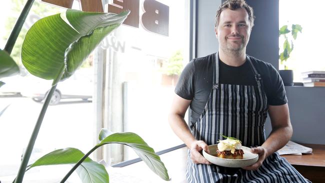 Bear With Me chef Lachie Fletcher with the eggs benedict on ham hock for Five of The Best. Picture: PATRICK GEE