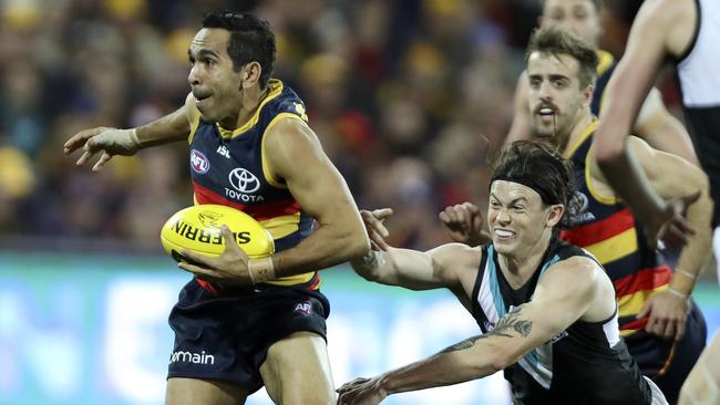 Eddie Betts dances away from Jasper Pittard. Picture SARAH REED