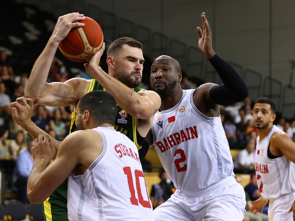 In action ... Isaac drives at the basket during the FIBA World Cup Qualification match in Melbourne between Australia and Bahrain, in February 2023.