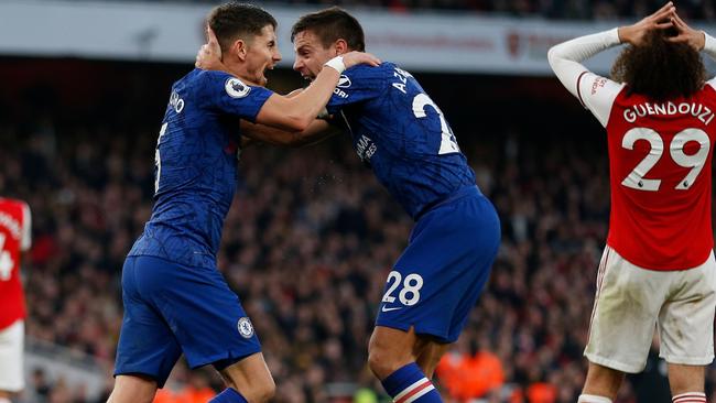 Chelsea midfielder Jorginho (L) celebrates scoring the equaliser against Arsenal. Picture: AFP