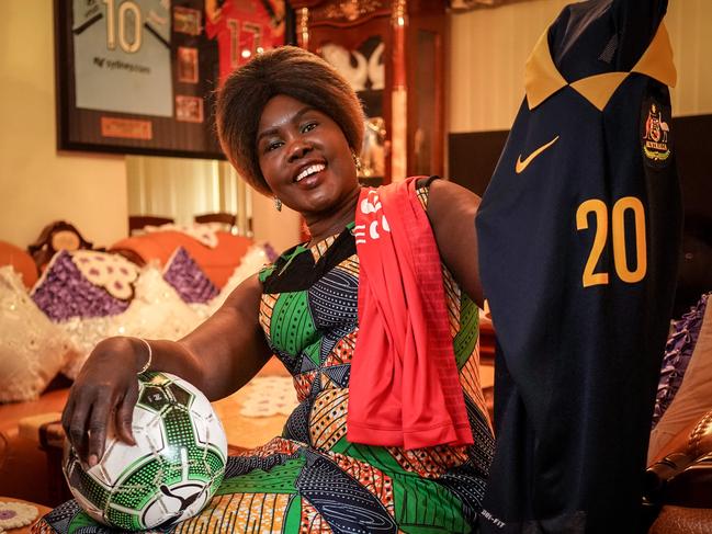 SOCCER - Awer Mabil's mum Agot Dau Atem happy after he scored a goal for the Socceroos overnight, photographed at her home, Tuesday, October 16, 2018 - pic AAP/MIKE BURTON