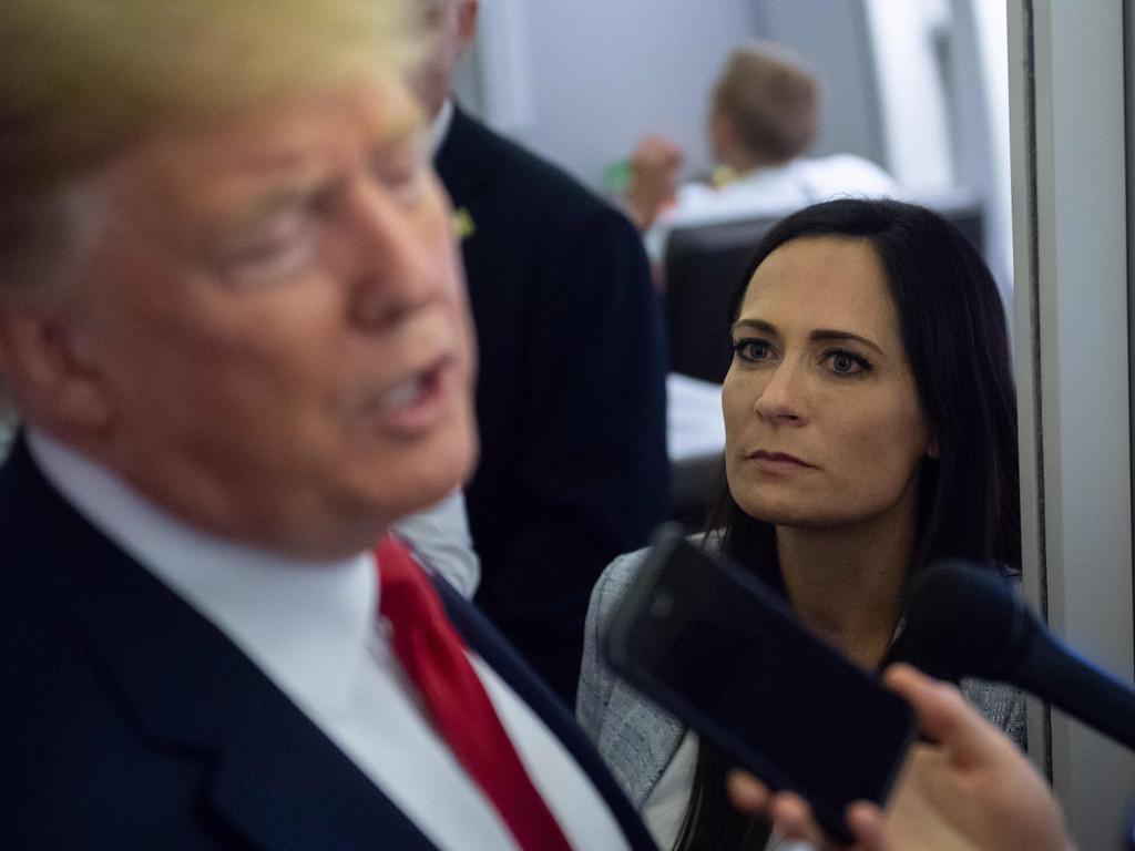 Stephanie Grisham and Donald Trump on Air Force One in 2019. Picture: Saul Loeb/AFP