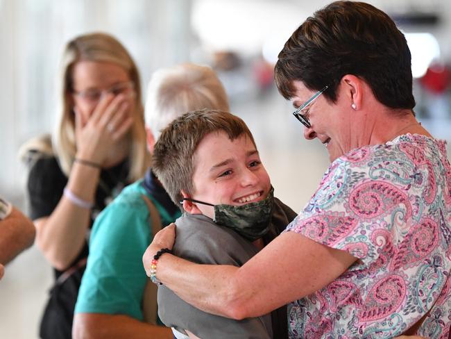 ADELAIDE, AUSTRALIA - NewsWire Photos December 18,  2020:  The Weatherill family is greeted by the Dawe family after arriving from Sydney and landing at Adelaide Airport. South AustraliaÃs borders remain open after COVID19 outbreak in Sydney. Picture: NCA NewsWire / David Mariuz