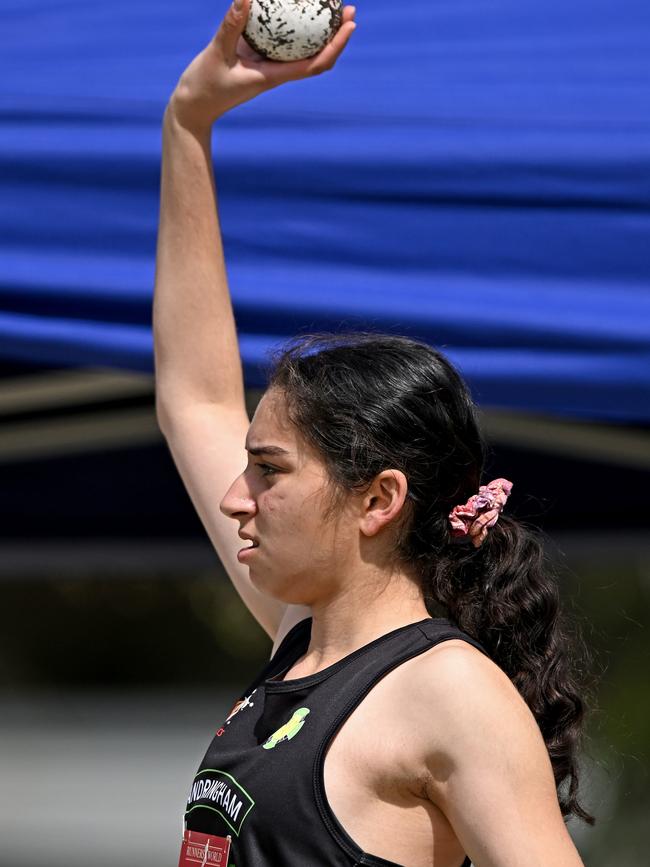 Abigail McMaster competes in the shot put. Picture: Andy Brownbill