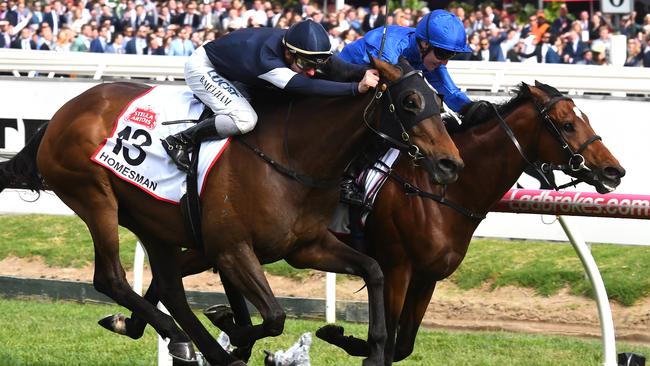 Best Solution narrowly defeats Homesman in the Caulfield Cup.