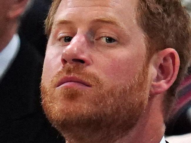 TOPSHOT - Britain's Prince Harry, Duke of Sussex attends the National Service of Thanksgiving for The Queen's reign at Saint Paul's Cathedral in London on June 3, 2022 as part of Queen Elizabeth II's platinum jubilee celebrations. - Queen Elizabeth II kicked off the first of four days of celebrations marking her record-breaking 70 years on the throne, to cheering crowds of tens of thousands of people. But the 96-year-old sovereign's appearance at the Platinum Jubilee -- a milestone never previously reached by a British monarch -- took its toll, forcing her to pull out of a planned church service. (Photo by Victoria Jones / POOL / AFP)