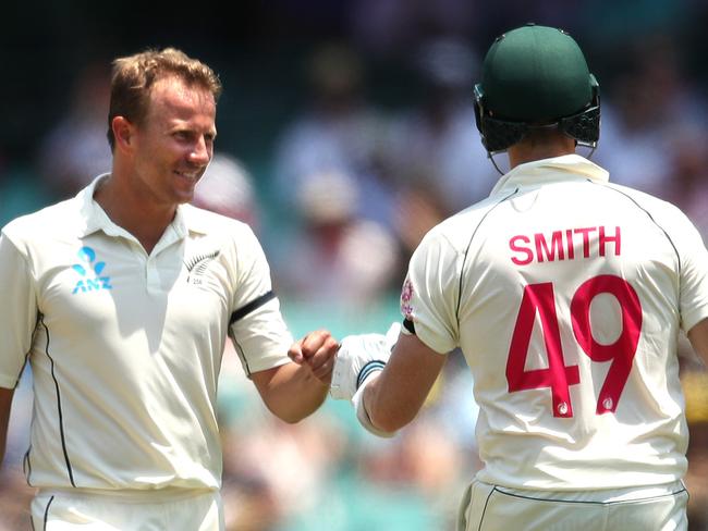 Neil Wagner of New Zealand taps fists with Australia's Steve Smith after Smith finally scored his first run of the innings during Day 1 of the Sydney Test match between Australia and New Zealand at the SCG. Picture. Phil Hillyard