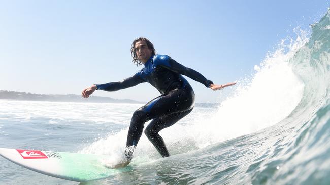  Hayden Forrest, 21, winds up a bottom turn at Point Leo. Picture: Jason Sammon