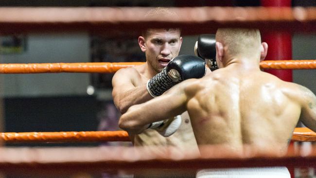 Steve Spark (left) fights Mick Whitehead as part of Locked Down Lights Up at Smithys TGW Gym, Saturday, July 11, 2020. Picture: Kevin Farmer