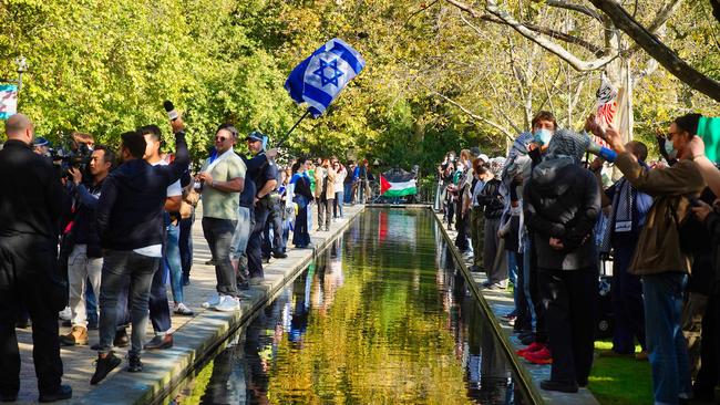 Jewish demonstrators face off against Pro-Palestinian protesters at Melbourne University on Thursday. Picture: Luis Enrique Ascui