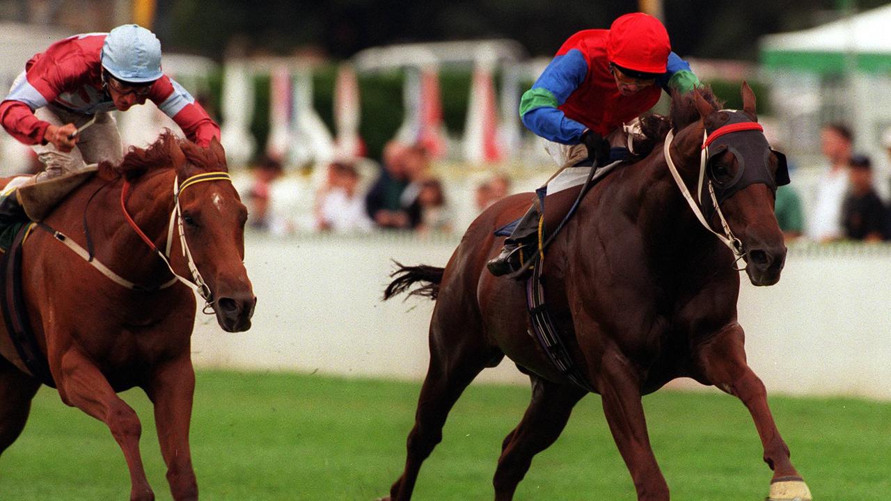 Racehorse 'Masked Party' (R) ridden by jockey Len (Lenny) Beasley, winning race 6 at Randwick in Sydney 05/04/1999.
