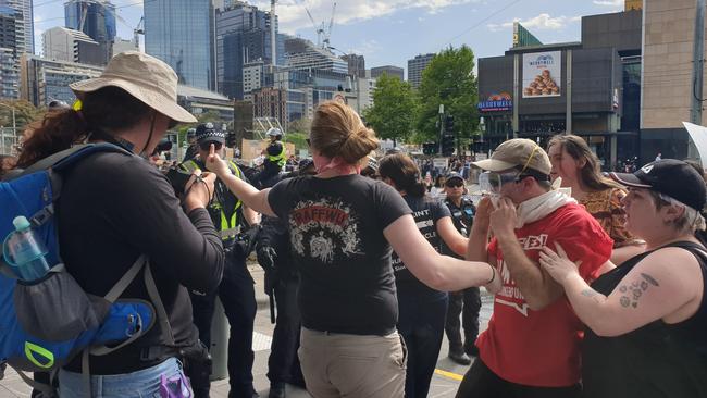 Protesters clash with police outside the IMRC. Picture: Mark Schliebs