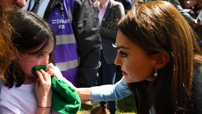 Catherine, Princess of Wales comforts Lucy during a walkabout at The Big Lunch in Windsor. Picture: Getty Images