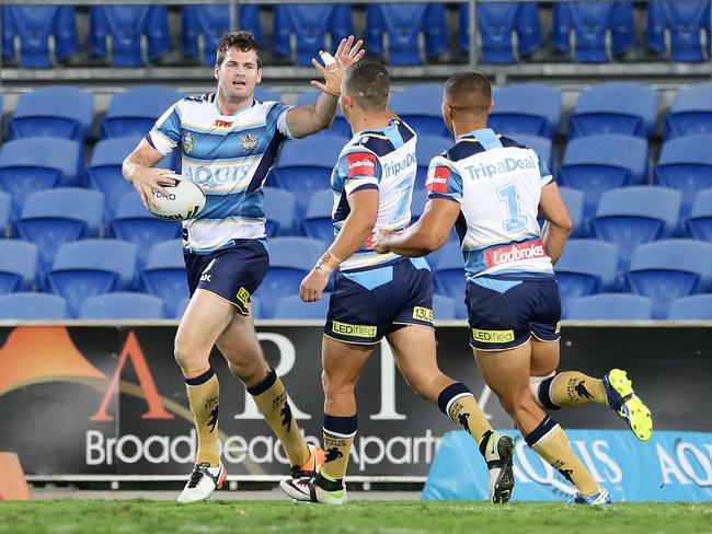 Titans Anthony Don scores against Parramatta at CBUS Super Stadium in 2016. Picture: Peter Wallis