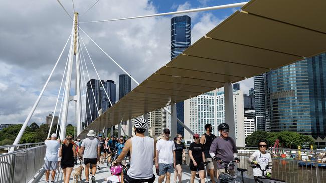 Crowds at the opening of the Kangaroo Point Bridge in Brisbane. Picture Lachie Millard