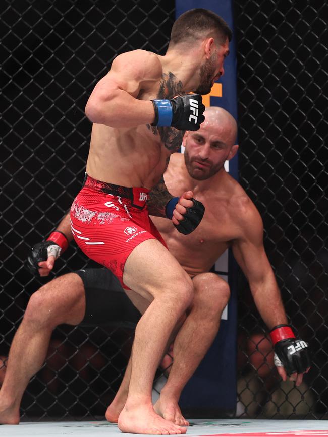 Ilia Topuria finishes Alex Volkanovski. Picture: Sean M. Haffey/Getty Images