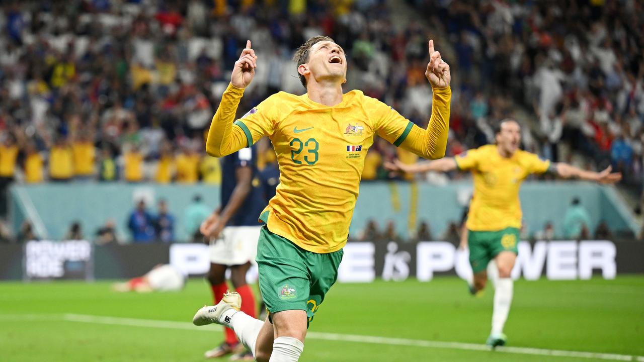 Craig Goodwin of Australia celebrates scoring his side's first goal during the FIFA World Cup Qatar 2022 Group D match between France and Australia. (Photo by Clive Mason/Getty Images)