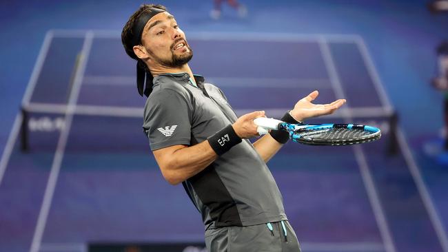 Fabio Fognini complains to the umpire while playing countryman Salvatore Caruso during their second-round match at the Australian Open Picture: AFP