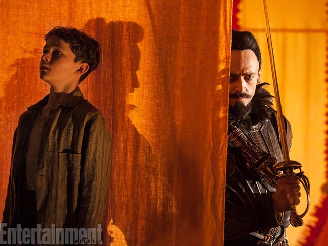 Levi Miller and Hugh Jackman in a scene from Pan. Picture: Laurie Sparham