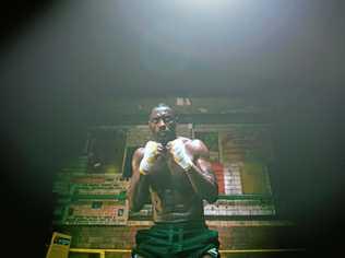 Idris Elba warms up before his first fight at London's Repton Club in a scene from the TV series Idris Elba: Fighter.