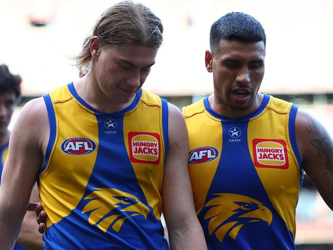 MELBOURNE, AUSTRALIA - JULY 07: Harley Reid and Tim Kelly of the Eagles look dejected after losing the round 17 AFL match between Melbourne Demons and West Coast Eagles at Melbourne Cricket Ground, on July 07, 2024, in Melbourne, Australia. (Photo by Quinn Rooney/Getty Images)