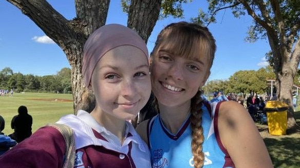 Lily Veenboer with her friend Charlotte Lane at school. Picture: Contributed