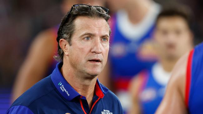 MELBOURNE, AUSTRALIA - MAY 05: Luke Beveridge, Senior Coach of the Bulldogs addresses his players at three quarter time during the 2024 AFL Round 08 match between the Western Bulldogs and the Hawthorn Hawks at Marvel Stadium on May 05, 2024 in Melbourne, Australia. (Photo by Dylan Burns/AFL Photos via Getty Images)