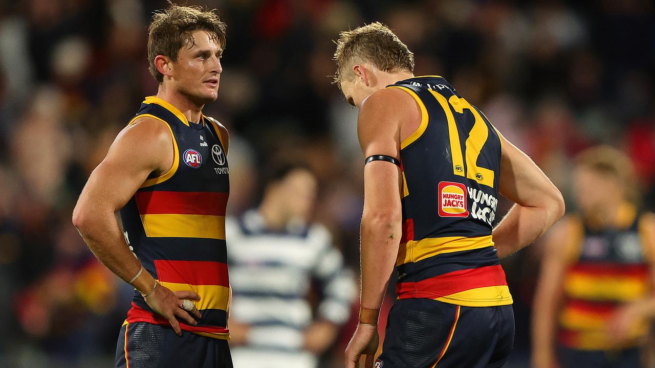 ADELAIDE, AUSTRALIA - MARCH 22: Matt Crouch ad Jordan Dawson of the Crows after the loss during the 2024 AFL Round 2 match between the Adelaide Crows and the Geelong Cats at Adelaide Oval on March 22, 2024 in Adelaide, Australia. (Photo by Sarah Reed/AFL Photos via Getty Images)