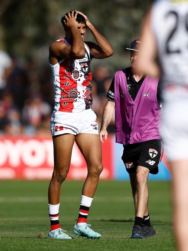 Nasiah Wanganeen-Milera after copping a big bump from Aidan Johnson. Picture: Michael Willson/AFL Photos