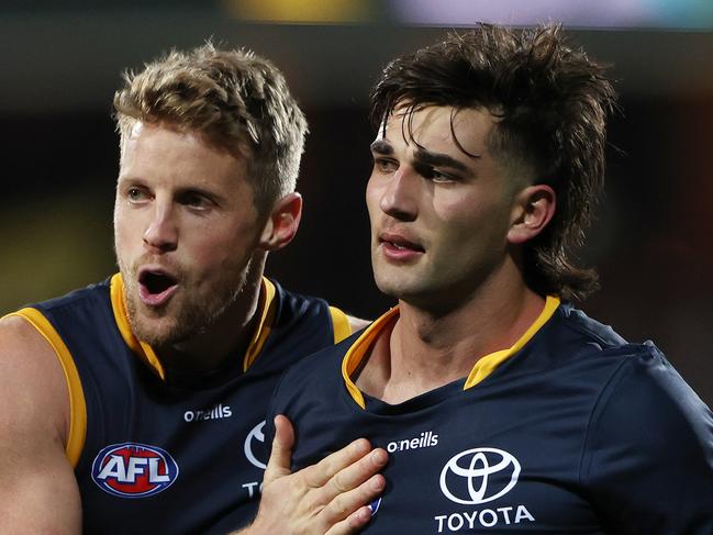 ADELAIDE, AUSTRALIA - JULY 15: Rory Sloane of the Crows tries to calm down Josh Rachele of the Crows during the 2023 AFL Round 18 match between the Adelaide Crows and the GWS Giants at Adelaide Oval on July 15, 2023 in Adelaide, Australia. (Photo by Sarah Reed/AFL Photos via Getty Images)