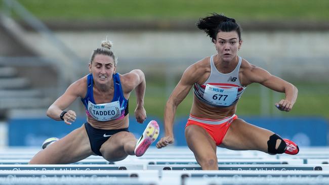 Celeste Mucci from Victoria on her way to beating Abbie Taddeo in the 100m hurdles.