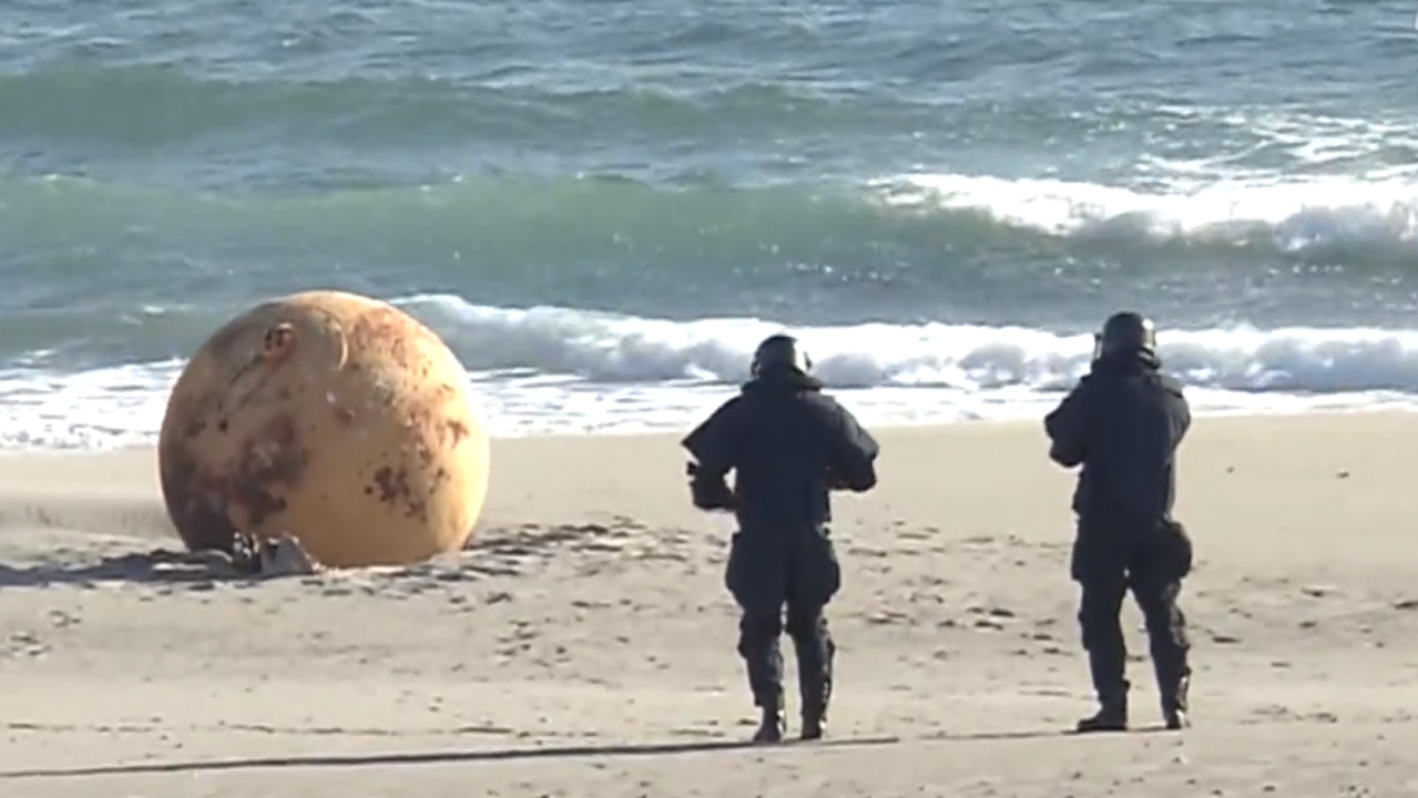 Japanese officials close Enshuhama beach to investigate massive iron