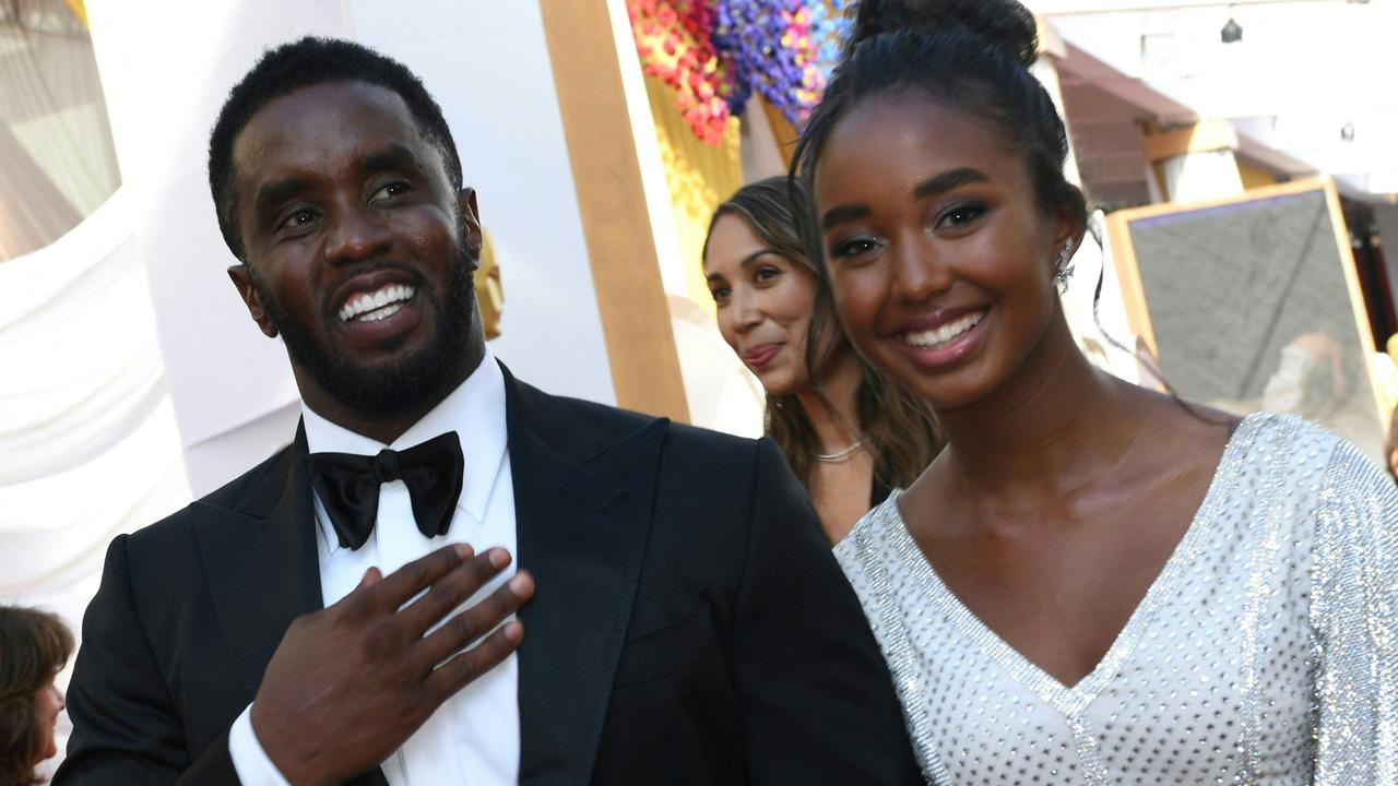 Sean “Diddy” Combs, with guest at the Oscars, has said the feud is over. (Photo by VALERIE MACON / AFP)