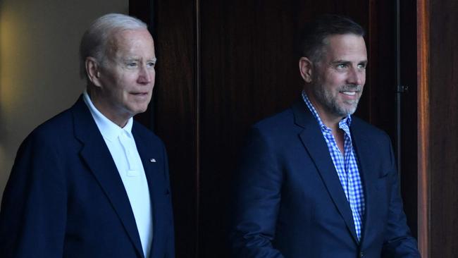 Joe Biden and his son Hunter Biden leave church. The Hunter Biden laptop story ‘could have derailed Joe Biden’s campaign’. Picture: AFP