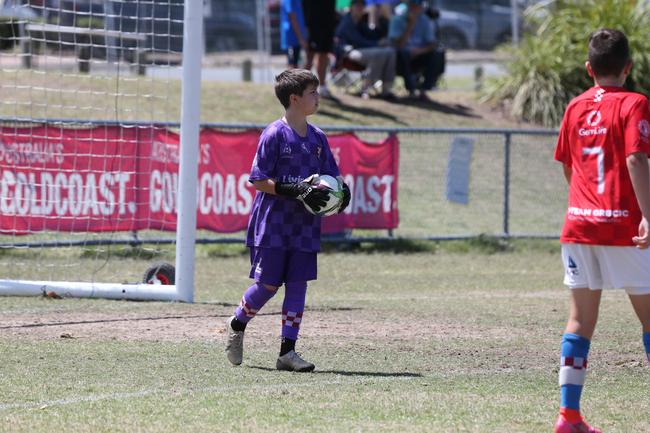 The Premier Invitational football tournament on the Gold Coast. Gold Coast Knights Red v Springfield United under-13s in action. Picture: Mike Batterham.