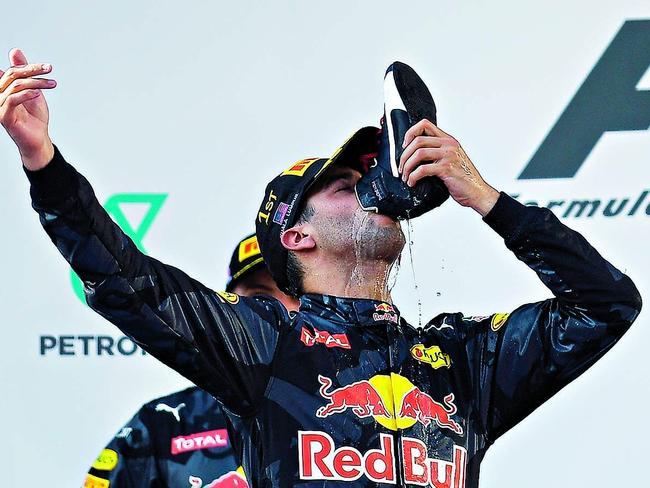 Daniel Ricciardo may have invented the “shoey” but more than anything, he is known for his perennial smile. Picture: AFP