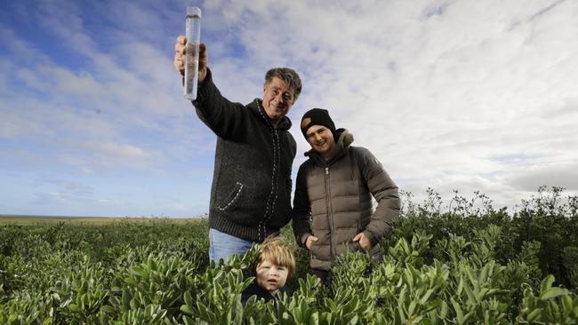 White River farmer Dion LeBrun with his son Harry, 13, and grandson Murray, 18 months. Picture: Robert Lang