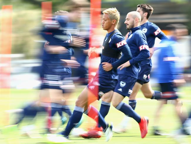 MELBOURNE, AUSTRALIA - DECEMBER 05:  Keisuke Honda runs during a Melbourne Victory A-League training session at Gosch's Paddock on December 5, 2018 in Melbourne, Australia.  (Photo by Robert Prezioso/Getty Images)