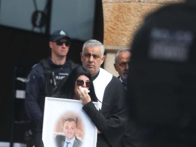 Bikie busting Raptor cops stood guard over his funeral. Picture: John Grainger