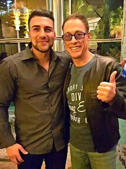 Jamal with Jean-Claude van Damme in 2013. Source: Facebook