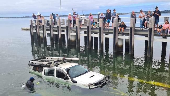 The HiLux was slowly towed out from the water. Picture: Supplied/Kate Crumpet